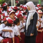 035696900_1437967494-20150727-Hari-Pertama-Masuk-Sekolah-Jakarta3