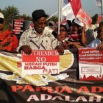 aksi-damai-di-depan-istana-papua-setia-pada-merah-putih-ug1Fw3zyNB