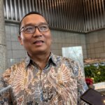 047014100_1779259876-Direktur_Utama_KPEI_Iding_Pardi-20_Mei_2026c